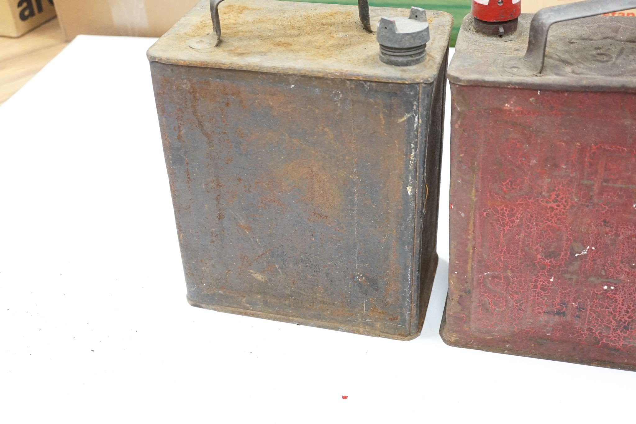 Three various petrol cans